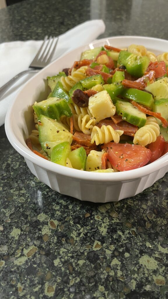 Cold Pasta Salad with a fork and a napkin. 